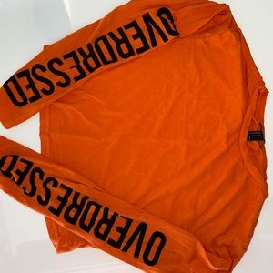 Overdressed orange shirt